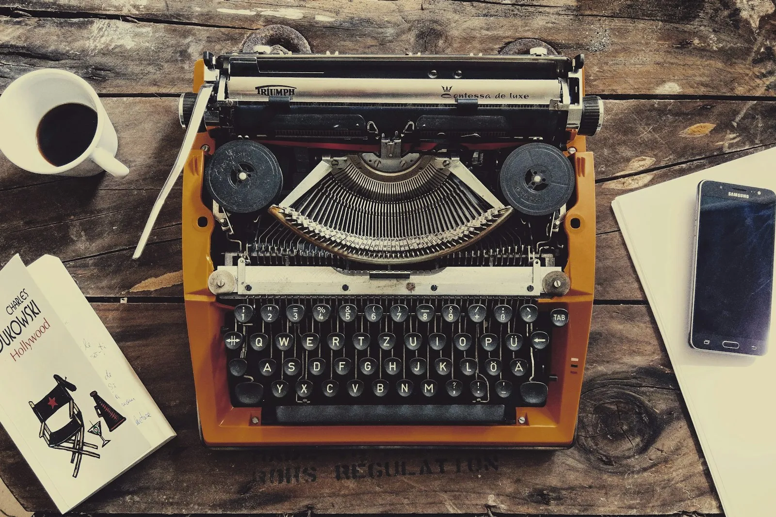 Vintage brown and black typewriter photographed up close