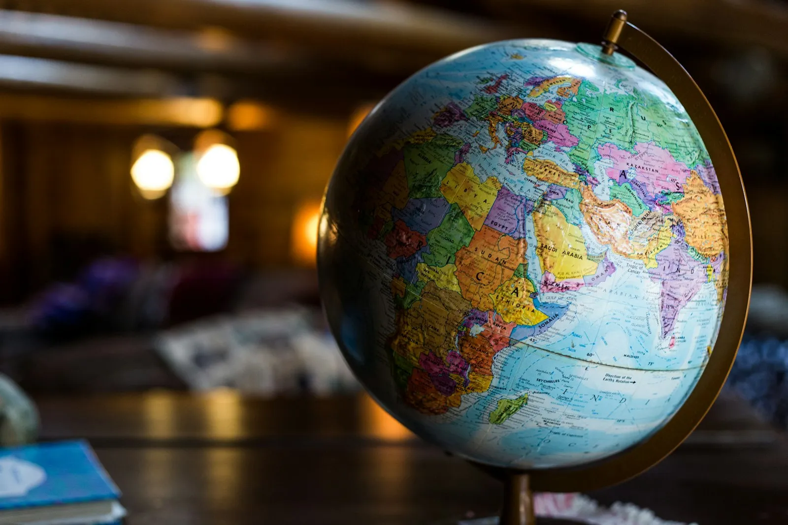 A desk globe on a table, evoking international and multi-region targeting